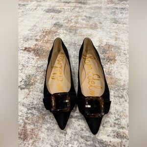 Sam Edelman Sonja black suede pointed ballet flat with a tortoiseshell buckle.